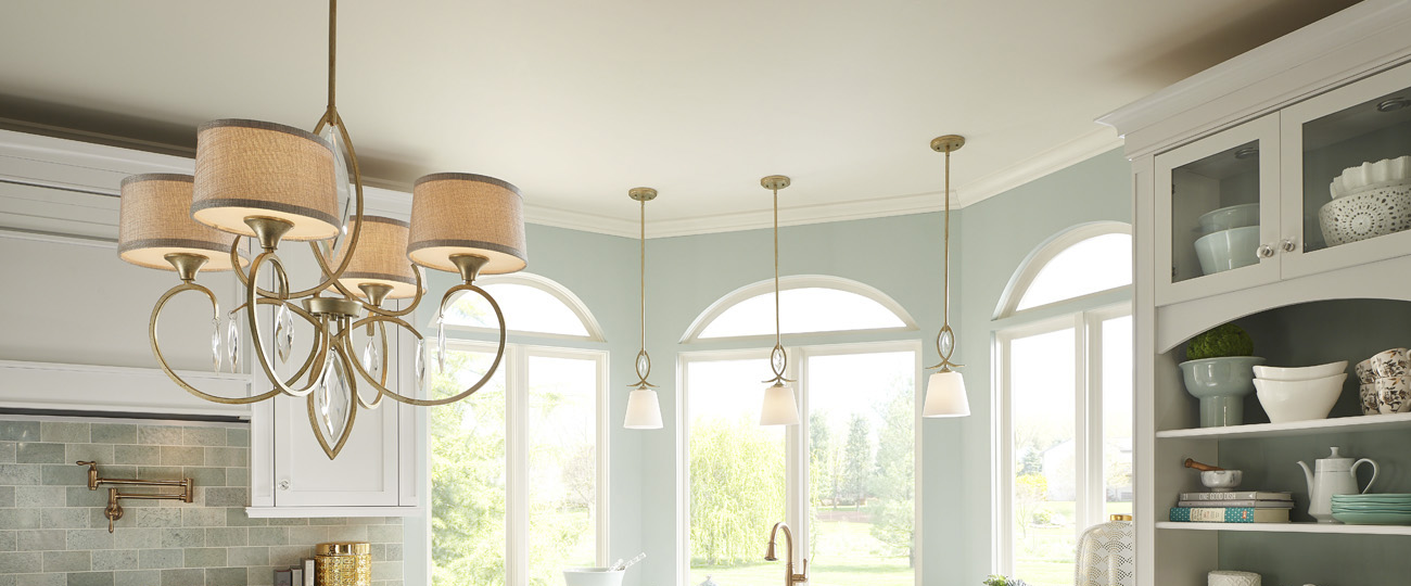 Light fixture hanging in a beautiful bright kitchen